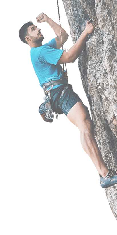 man climbing rock